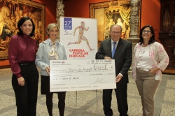 LA OBRA SOCIAL DE IBERCAJA ENTREGA LA AYUDA SOLIDARIA DE LA CARRERA POPULAR AL BANCO DE ALIMENTOS
